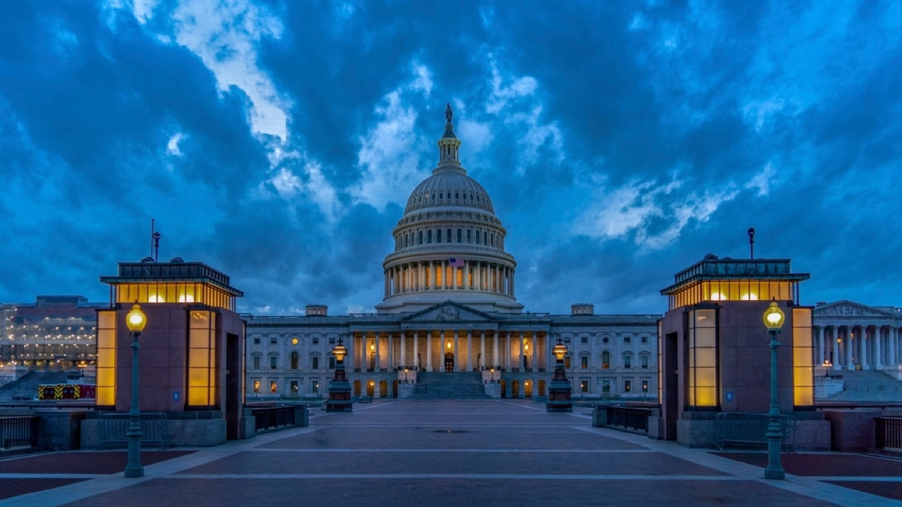 The United States Capitol building in Washington, D.C. at dusk.
